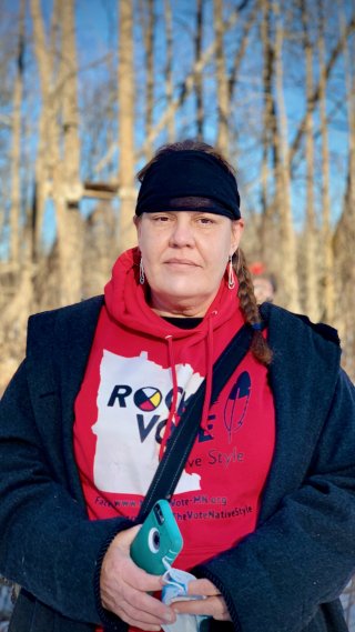 Image: Nancy Marie Beaulieu, a member of the Leech Lake Band of Ojibwe, at the Mississippi River, where HSBC-funded Enbridge are planning to build the Line 3 pipeline over the river. Image credit: Sarah LittleRedfeather, Honor the Earth