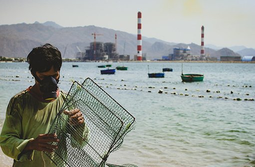 A local fisherman at the Vung Ang coal power station in Vietnam. Credit: CHANGE / Thieu Duyen